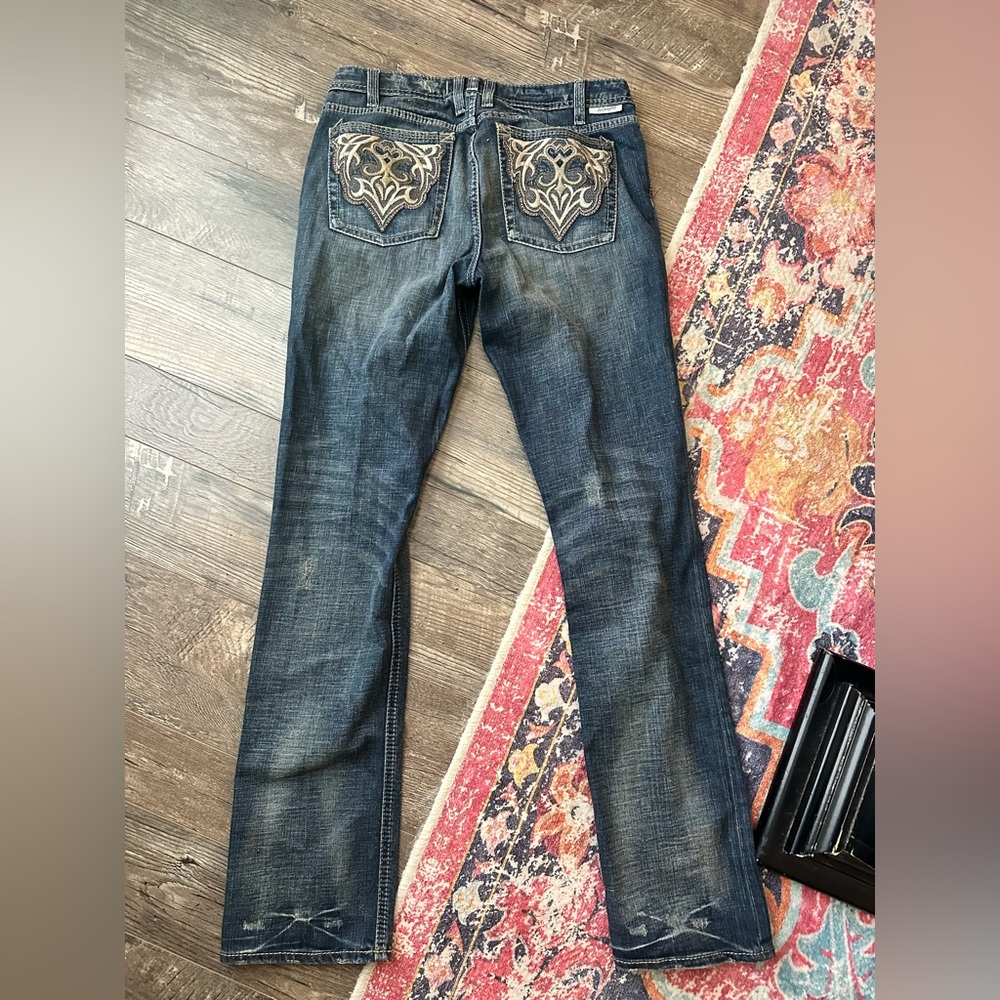 Blue Boot Cut Jeans with designed Back Pockets